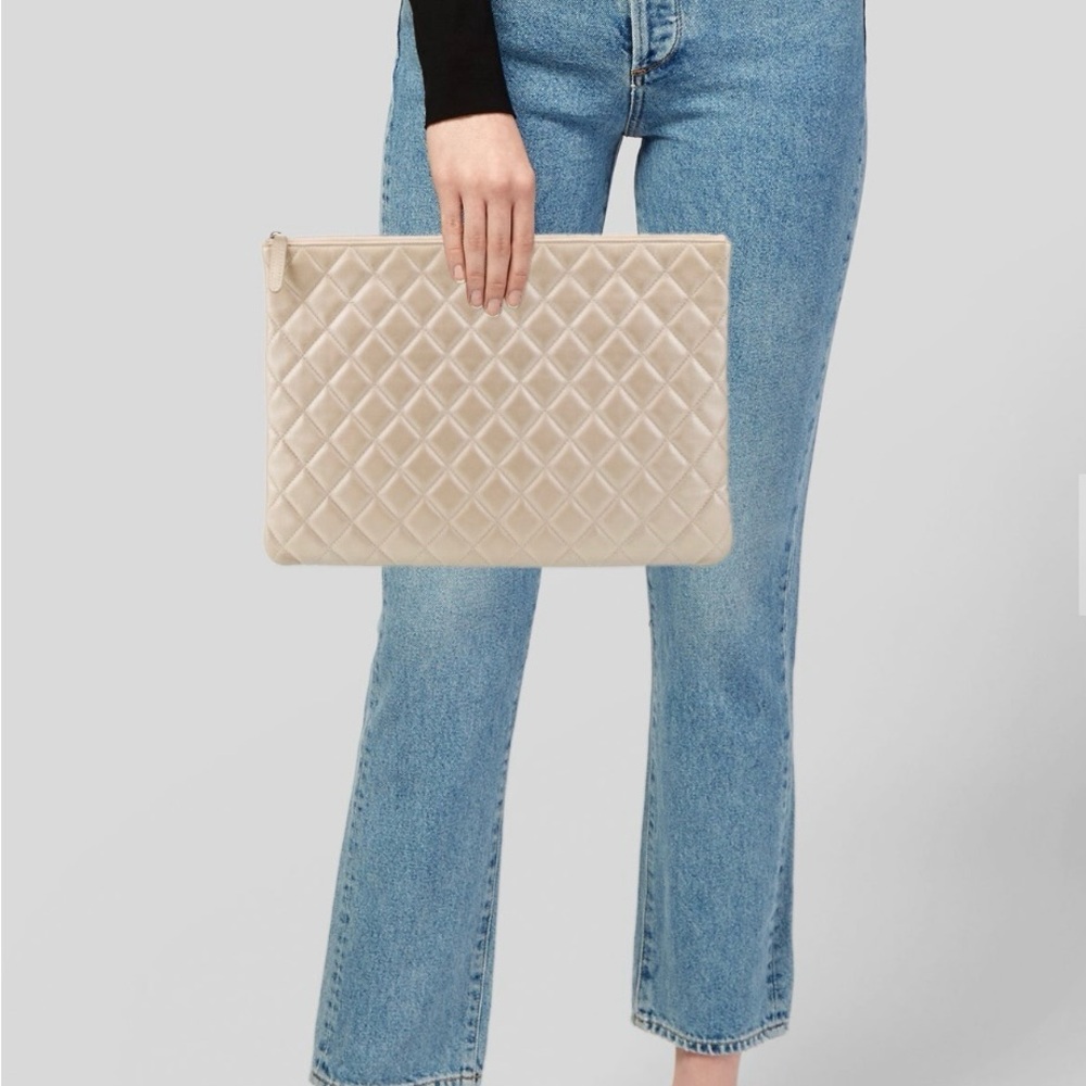 CHANEL Cream Quilted Clutch